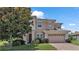 Two story home with a two car garage at 318 Crescent Ridge Rd, Auburndale, FL 33823
