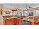 Kitchen with granite countertops and a breakfast bar at 318 Crescent Ridge Rd, Auburndale, FL 33823