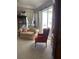 Relaxing sitting area with comfortable seating and access to backyard at 102 Jardin Ln, Winter Haven, FL 33884