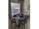 Breakfast nook with table and chairs, bathed in sunlight at 102 Jardin Ln, Winter Haven, FL 33884