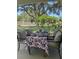Relaxing patio with dining set, perfect for outdoor entertaining at 102 Jardin Ln, Winter Haven, FL 33884
