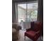 View of backyard oasis featuring patio furniture and lush greenery at 102 Jardin Ln, Winter Haven, FL 33884
