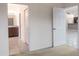 Bedroom with access to bathroom and living area at 4568 Back Nine Dr, Winter Haven, FL 33884