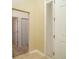 Clean hallway with neutral walls and tile floors at 4568 Back Nine Dr, Winter Haven, FL 33884