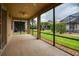Spacious screened porch overlooking backyard with ceiling fan at 4568 Back Nine Dr, Winter Haven, FL 33884