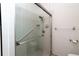 Clean shower with grab bar and sliding glass door at 4568 Back Nine Dr, Winter Haven, FL 33884
