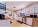 Bright kitchen features stainless steel appliances and wood countertops at 8881 Cypresswood Dr, Lake Wales, FL 33898