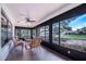 Spacious screened porch overlooking the backyard and neighborhood at 8881 Cypresswood Dr, Lake Wales, FL 33898