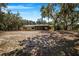 House with large backyard and mature trees at 8881 Cypresswood Dr, Lake Wales, FL 33898