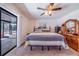 Bedroom with sliding glass doors leading to the backyard at 8881 Cypresswood Dr, Lake Wales, FL 33898