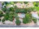 Single-story house with a pool, surrounded by trees at 8881 Cypresswood Dr, Lake Wales, FL 33898