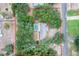 Single-story home on a large lot with lush trees at 8881 Cypresswood Dr, Lake Wales, FL 33898