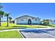 Community pool house with accessible parking and lake view at 1472 Leamington Ln, Winter Haven, FL 33884