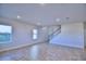 Spacious living room with tile floors and plenty of natural light at 1472 Leamington Ln, Winter Haven, FL 33884