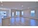 Spacious living room with tile floor and lots of natural light at 1472 Leamington Ln, Winter Haven, FL 33884