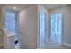 Upper level hallway with doors to bedrooms and a view of the lower level at 1472 Leamington Ln, Winter Haven, FL 33884