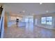 Open concept kitchen with an island and views to the backyard at 1472 Leamington Ln, Winter Haven, FL 33884