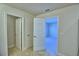 Bedroom with access to bathroom and additional rooms at 1472 Leamington Ln, Winter Haven, FL 33884
