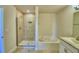 Bathroom features a shower, garden tub, and double vanity at 1472 Leamington Ln, Winter Haven, FL 33884