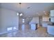 Open concept dining area adjacent to kitchen and living room at 1472 Leamington Ln, Winter Haven, FL 33884