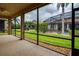 Screened porch with view of backyard and pool at 4568 Back Nine Dr, Winter Haven, FL 33884