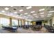 Large community room with tables and chairs for events at 4568 Back Nine Dr, Winter Haven, FL 33884