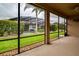 Screened porch overlooking a lush backyard at 4568 Back Nine Dr, Winter Haven, FL 33884