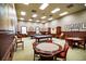 Community game room with pool tables and card tables at 4568 Back Nine Dr, Winter Haven, FL 33884