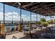 Covered patio overlooking a pool and lake at 4568 Back Nine Dr, Winter Haven, FL 33884