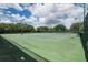 Well-maintained tennis courts with surrounding fence at 4568 Back Nine Dr, Winter Haven, FL 33884