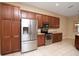 Bright kitchen featuring stainless steel appliances and wood cabinets at 4568 Back Nine Dr, Winter Haven, FL 33884