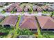 Aerial view showcasing home's location and solar panels at 4568 Back Nine Dr, Winter Haven, FL 33884