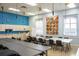 Craft room with tables, chairs, and plenty of workspace at 4568 Back Nine Dr, Winter Haven, FL 33884
