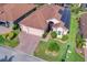 Single-story house with solar panels and brick driveway at 4568 Back Nine Dr, Winter Haven, FL 33884