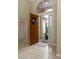Open entryway with tile floor and door leading to a screened porch at 4568 Back Nine Dr, Winter Haven, FL 33884