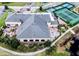 Aerial view of community clubhouse and pool area at 4568 Back Nine Dr, Winter Haven, FL 33884