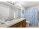Bathroom boasts dual sinks, granite countertop, and a shower/tub combo at 6421 Alamanda Hills Dr, Lakeland, FL 33813