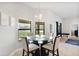 Casual dining area with glass top table and four chairs at 6421 Alamanda Hills Dr, Lakeland, FL 33813