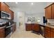 Well-equipped kitchen with ample cabinetry and kitchen island at 6421 Alamanda Hills Dr, Lakeland, FL 33813