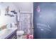 Bathroom with a toilet, sink, and shower at 329 N 19Th St, Haines City, FL 33844