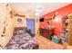 Cozy bedroom with a twin bed and built-in shelving at 329 N 19Th St, Haines City, FL 33844