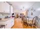 Kitchen with a dining area and view into the living room at 329 N 19Th St, Haines City, FL 33844
