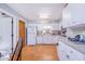 Bright kitchen featuring white cabinetry and wood flooring at 329 N 19Th St, Haines City, FL 33844