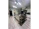 Community kitchen with stainless steel appliances at 657 Sweetwater Way, Haines City, FL 33844