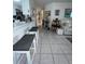 Kitchen with breakfast bar and open living area at 657 Sweetwater Way, Haines City, FL 33844