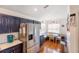 Kitchen features a breakfast nook and stainless steel refrigerator at 4353 Dinner Lake Dr, Lake Wales, FL 33859