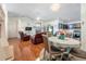 Open living room with hardwood floors and a fireplace at 4353 Dinner Lake Dr, Lake Wales, FL 33859