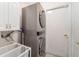 Laundry room with stackable washer and dryer at 4353 Dinner Lake Dr, Lake Wales, FL 33859