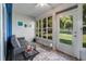 Bright sunroom with tiled floor and access to backyard at 4353 Dinner Lake Dr, Lake Wales, FL 33859