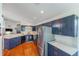Modern kitchen with stainless steel appliances and dark blue cabinetry at 4353 Dinner Lake Dr, Lake Wales, FL 33859
